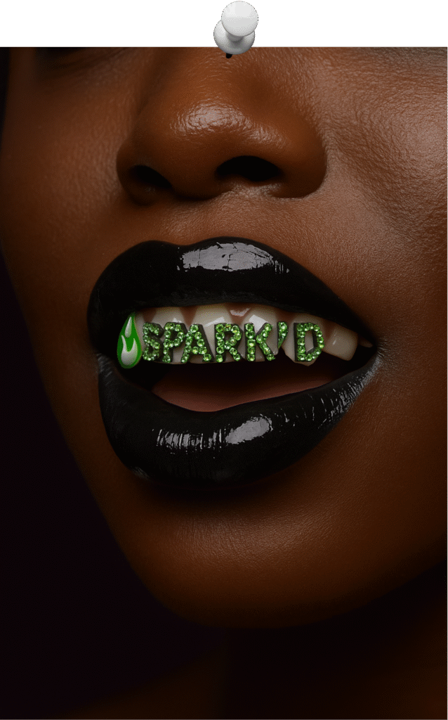 Tooth jewels spelling out SPARK'D to emphasize polished, but non-traditional essence of SPARK'D By Yelley.